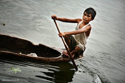 Boat boy, Lake Sebu