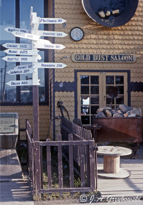 Distance post in front of Nugget Inn, Nome