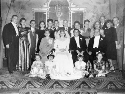 Wedding of Richard's aunt Clara and uncle Morris - mother's side. Hilda & Paul - 3rd & 4th from the left , back row (1946)