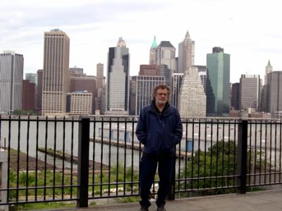 Richard on the Brooklyn Heights Promenade with part of the Manhattan skyline in the background