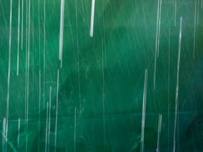 Rain against the battered ferry hull