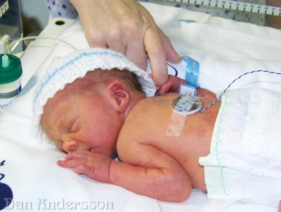 Holding Mummy's finger