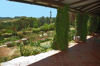 A broad veranda looking over the garden and farm