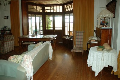 Wooden bay window opens onto the veranda