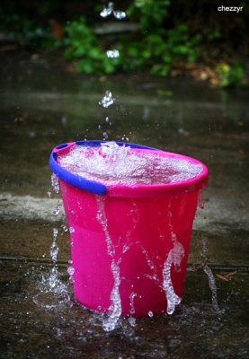 0161- bucket catching rain overflow