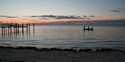 Netting baitfish at dawn