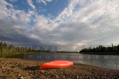 081706-125.1 Canoe in sun  clouds