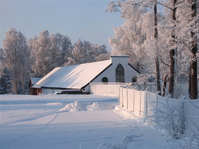 The old forge in sunny snow