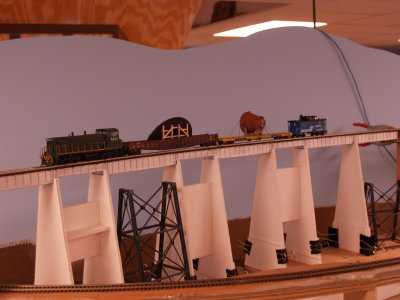 Conrail High-Wide Special on Dave T.'s layout. At the high bridge west of Parchment.