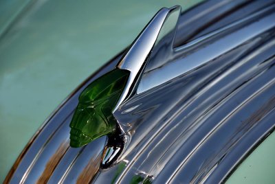 Matching green Chief Pontiac hood ornament