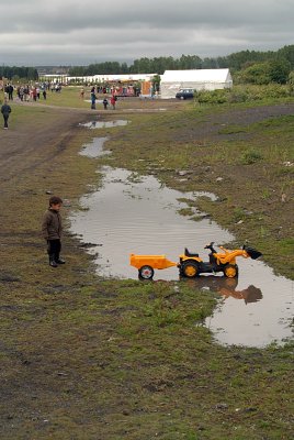 Toy Dumper Truck in Puddle