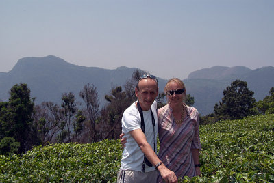 Chris & I in Tea Garden with Sleeping Lady Mountains behind
