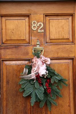 Residence Holiday Wreath below Bleecker Street