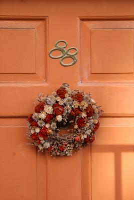 Residence Holiday Wreath below Bleecker Street