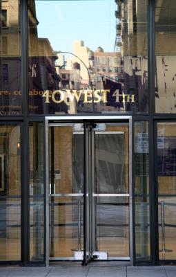 Greene Street Reflected in the Entrance to NYU's Tisch Building