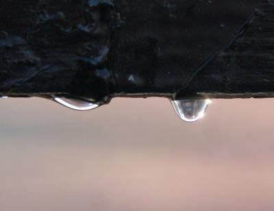 Water Drops Under a Railing