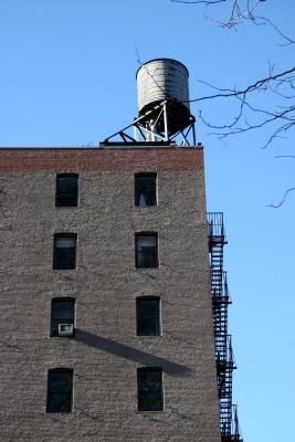 Building, Windows, Air Conditioner, Water Tower & Fire Escape