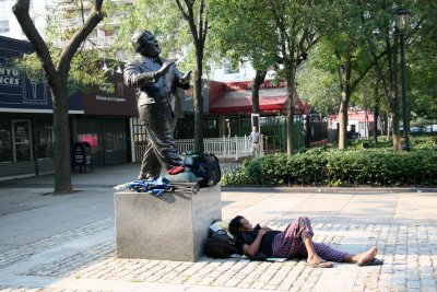 Resting at the Foot of Mayor LaGuardia Statue