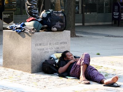 Resting at the Foot of Mayor LaGuardia Statue