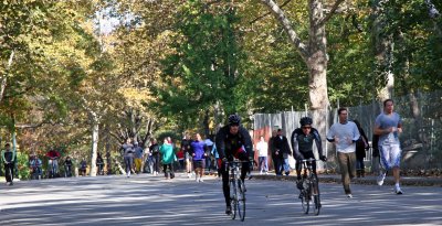 Bicylists & Runners on CPW Roadway