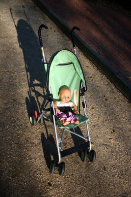 Doll Stroller in the Bocce Ball Court