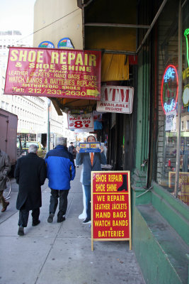 Street Scene - Shoe Repair, Lottery Tickets, ATM's & Haircuts