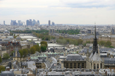 View of Saint-Chapelle, the Louvre, and the modern Defense district from the Notre Dame