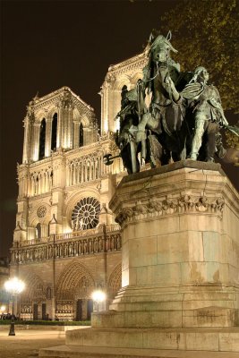 Notre Dame and Charlemagne monument at night