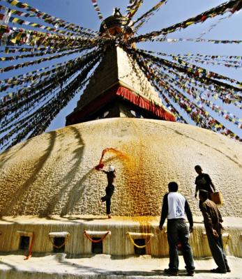 Painting of the Great Stupa.  This is usually carried out in Tibetan New Year and important Buhdism holy days.