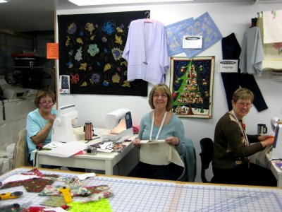 Fiona, Jane & Margaret sewing their stockings