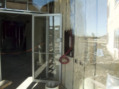 Inside main entrance looking through the front door glass