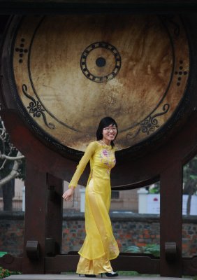 Graduating university student joyful after beating the gong at Confucius Temple of Literature.jpg