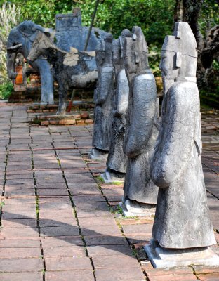 Statues of an elephant and horse and warriors in the honor court in the burial area of the Tuc Duc Tomb.JPG