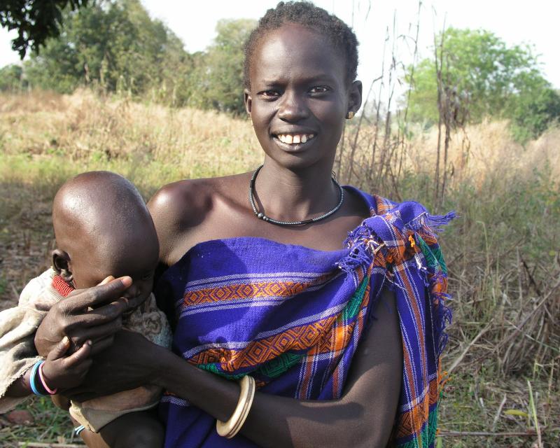 Woman In Purple With Baby