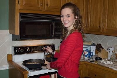 Erica helping with dinner