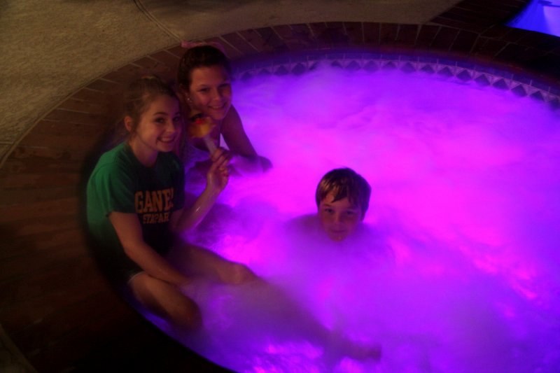 THREE KIDS IN A HOT TUB