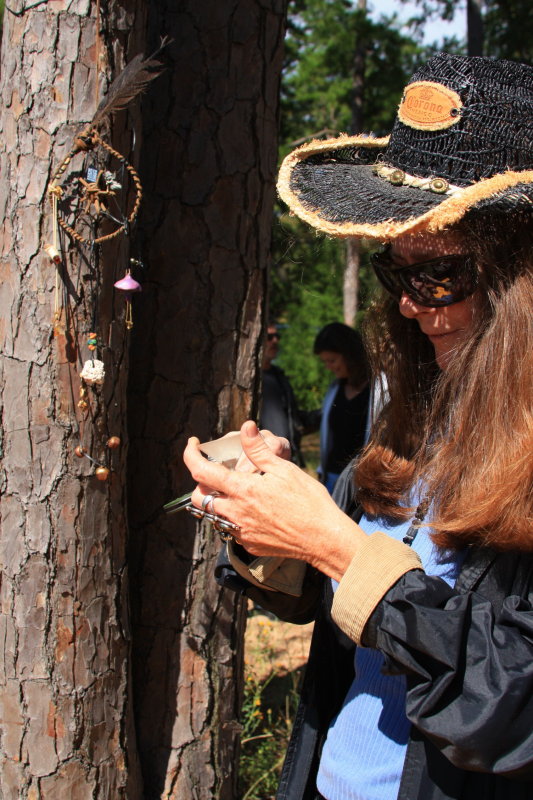 RAVIS PUTTING THE FINISHING TOUCHES ON A DREAM CATCHER
