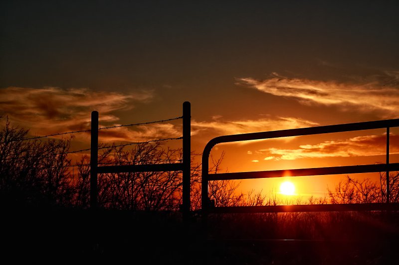 SUNSET THRU THE GATE
