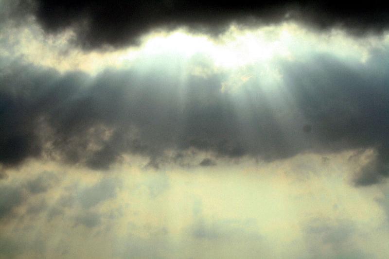 RAYS THROUGH THE STORM CLOUDS