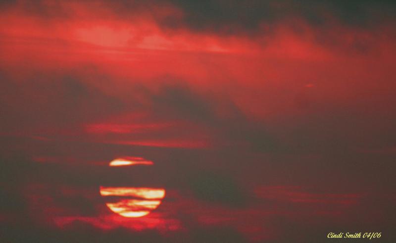 SUN HIDING IN THE CLOUDS