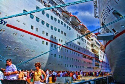 THE CARNIVAL ECSTASY ON THE LEFT AND THE CARNIVAL TRIUMPH ON THE RIGHT