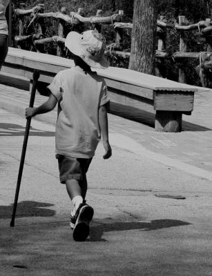 A KID WITH HIS STICK