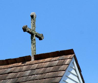 OLD CROSS ON TOP OF CHURCH
