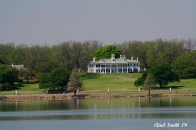A VIEW OF HL HUNT'S HOUSE, MOUNT VERNON, FROM ACROSS THE LAKE