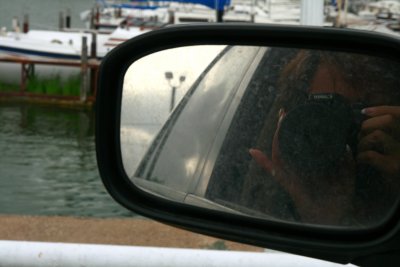 ME IN A VERY DIRTY REAR VIEW MIRROR