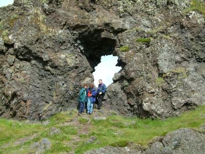 My wife and our friends by a hole in the rock