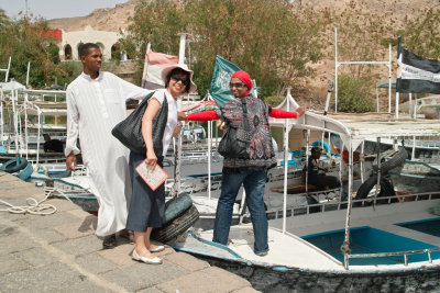 Boarding a boat to Philae Temple