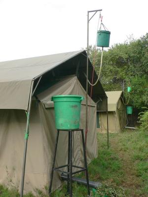 Hot Water for Showers (high bucket), Cold Water for Toilet (lower bucket)