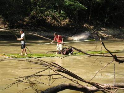 sin on bamboo raft going down river