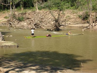 using the raft as a ferry to take us back and forth across the river